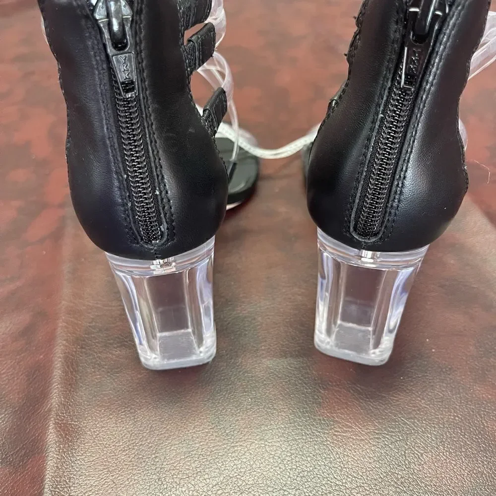 Deltan clear and‎ black heels new without tags, size 6.5